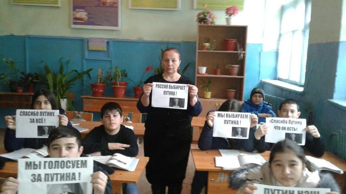 In Dagestan, schoolchildren and a teacher were photographed with posters in support of Putin. - news, Politics, Twitter, Peskov's mustache, Video, Opinion