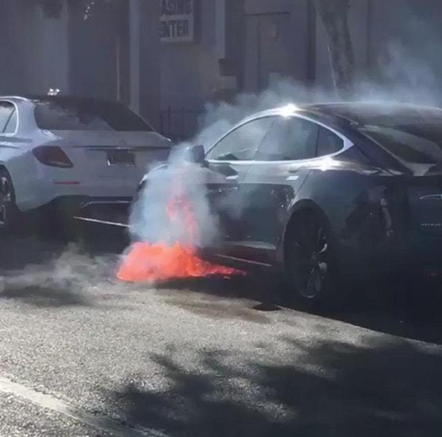 Tesla electric car batteries caught fire - Tesla, Tesla, Fire