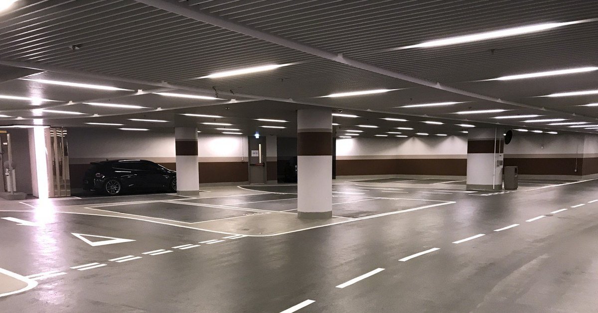 Parking bays. Парковочное место. Парковочное место в паркинге. Ограждение паркинга. Парковочное место фото.