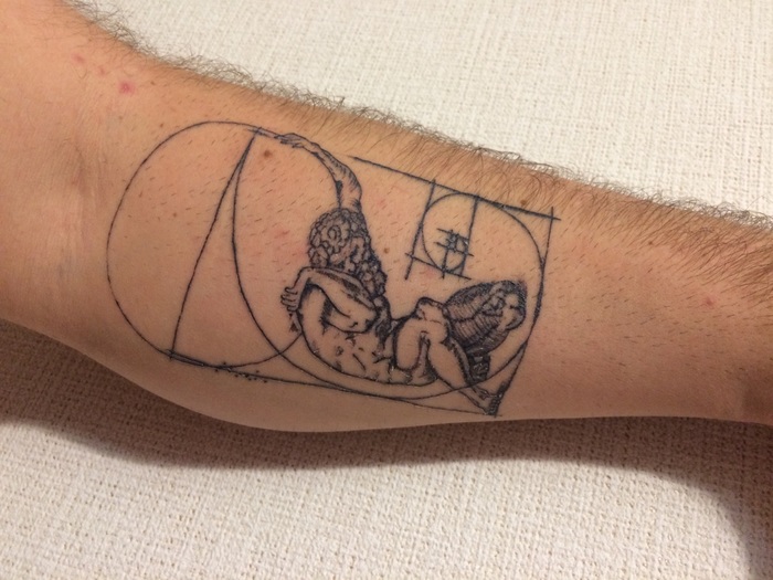 My second tattoo. Titan holds the Earth (Vatican Atlas cover) and the Fibonacci Spiral (Golden Ratio) - My, Tattoo, Fibonacci spiral, Titanium