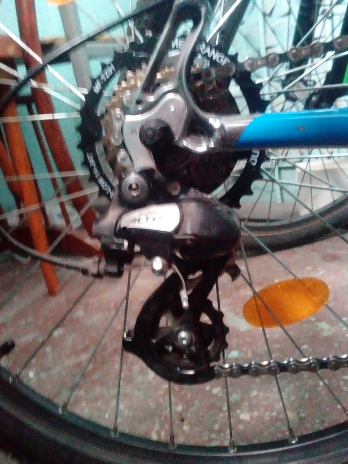 Задний переключатель скоростей на велосипеде фото с цепью