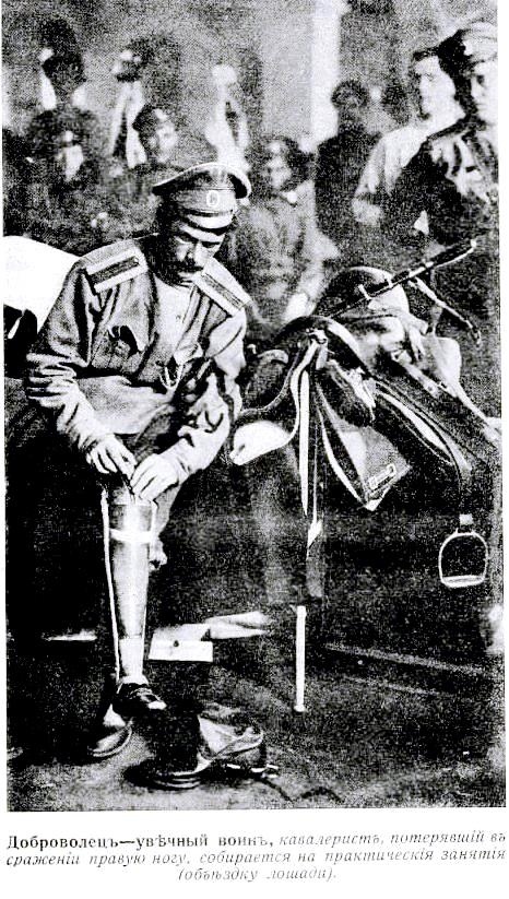 A cavalryman puts on a prosthetic right leg before dressage. - Story, Historical photo, Российская империя