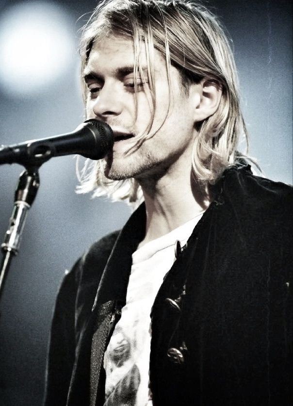 Let's write a rock song. A couple of lines. I'll start Gray morning fog shrouded sleepy minds - The photo, Kurt Cobain, The singers