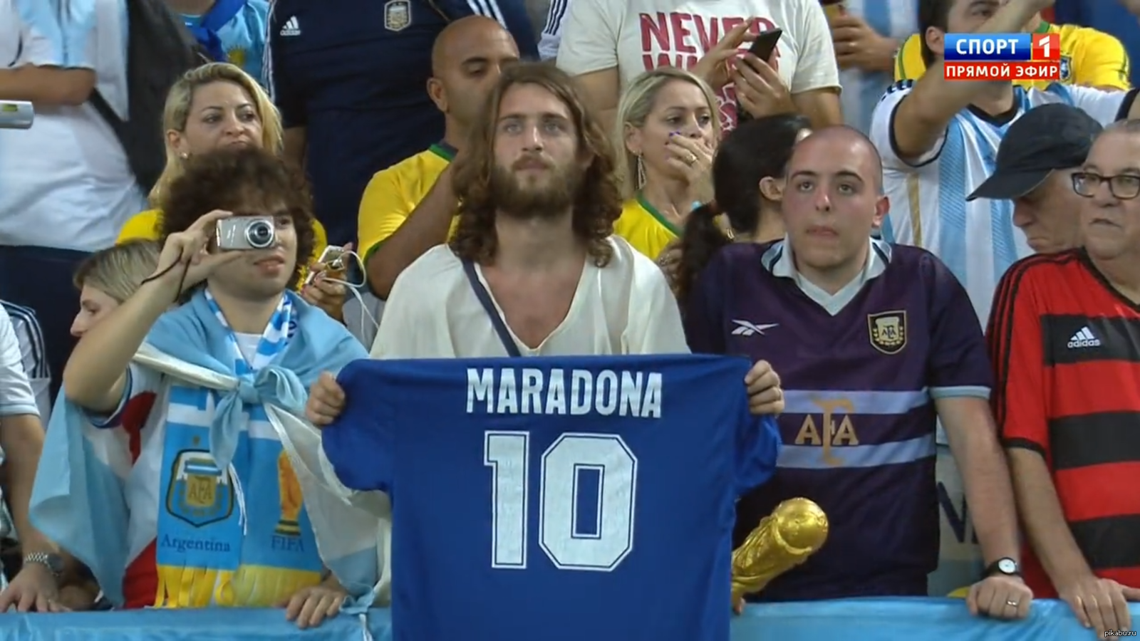 Nothing out of the ordinary, just Jesus with a Maradona jersey at the Argentina vs Bosnia and Herzegovina match. - Football, World Cup 2014, Diego Maradona, Jesus Christ