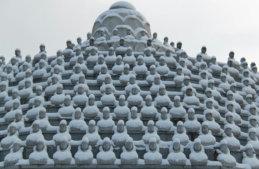 Snow-covered Buddha statues at a temple in Okcheon, South Korea. - Buddha, Snow, South Korea