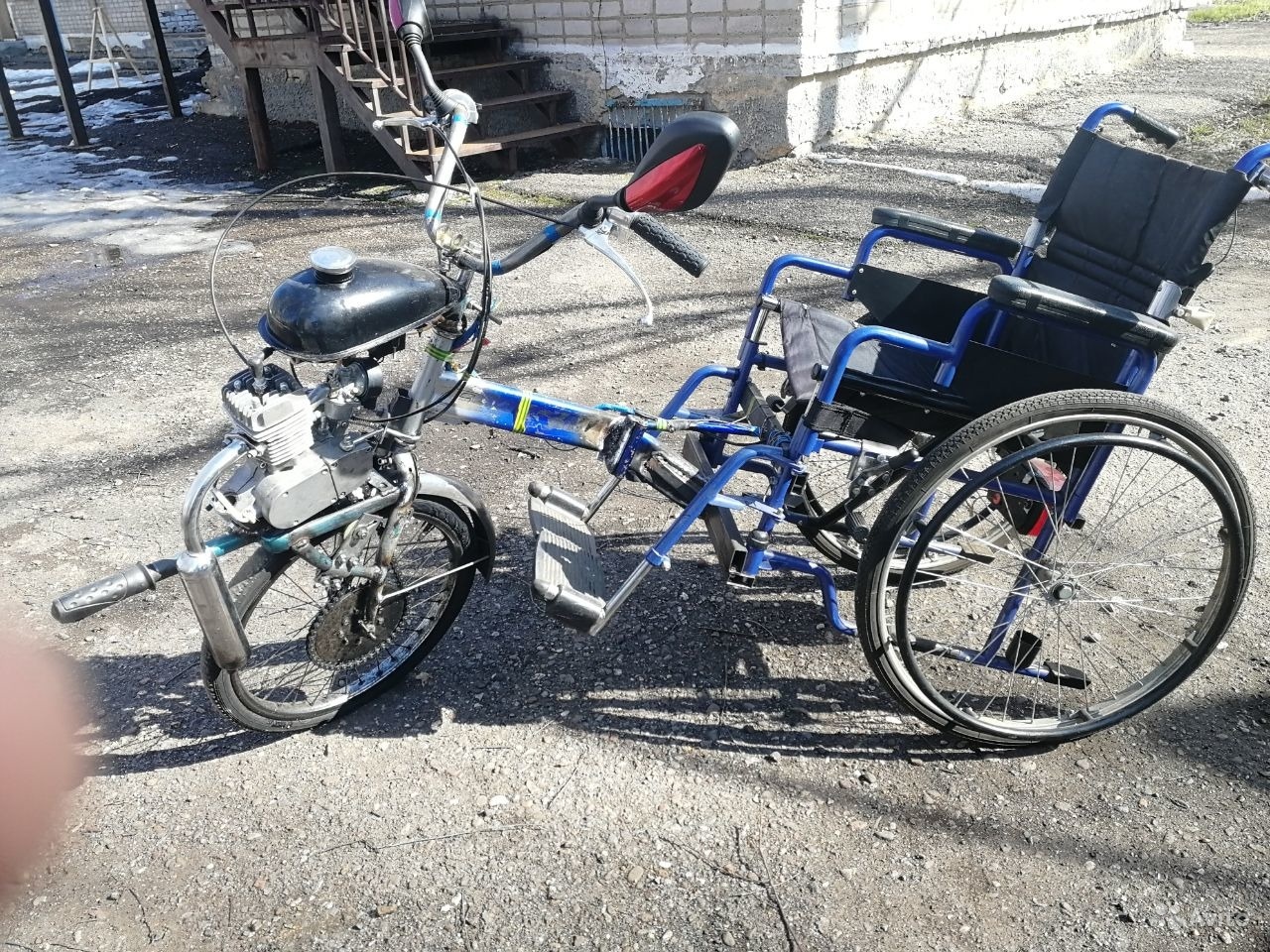 Инвалидная коляска с бензиновым двигателем