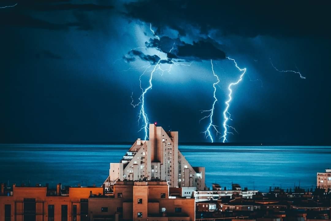 Incredibly beautiful photos of a thunderstorm - The photo, Thunderstorm, Sea, Town, Lightning