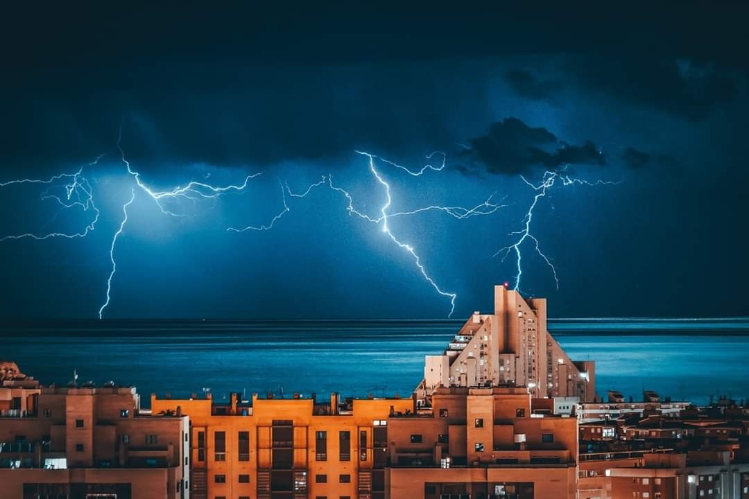 Incredibly beautiful photos of a thunderstorm - The photo, Thunderstorm, Sea, Town, Lightning